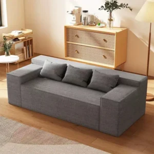 Light gray couch in a minimalist modern living room setting