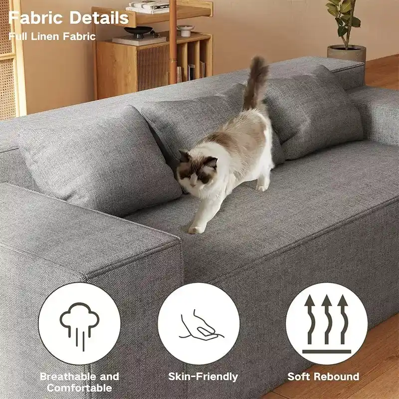 Compressible frameless sofa being unboxed in a small apartment