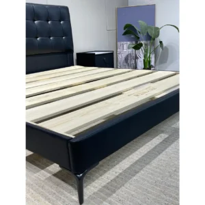 Premium black full size bed featuring a top-grain cowhide leather headboard Premium black full size bed featuring a top-grain cowhide leather headboard