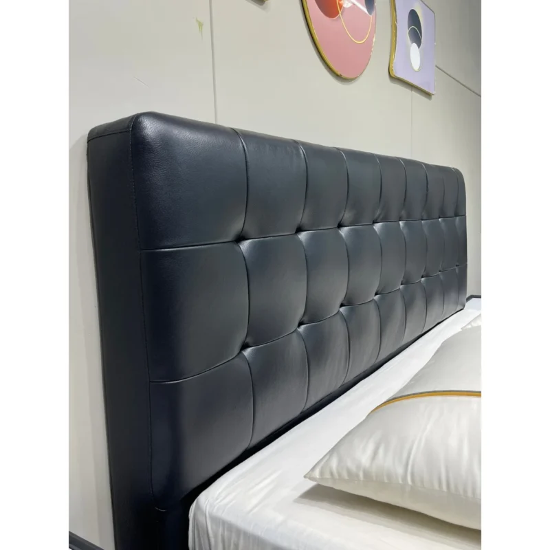 Side view of a black full size bed showing the durable solid pine wood frame Side view of a black full size bed showing the durable solid pine wood frame