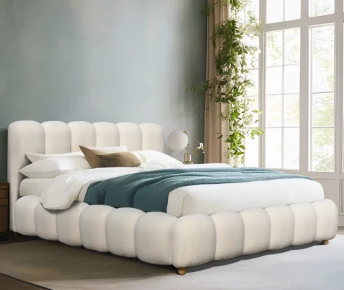 white upholstered bed