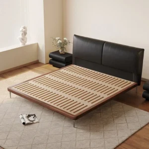 Modern mid century bed with black leather headboard and wooden platform